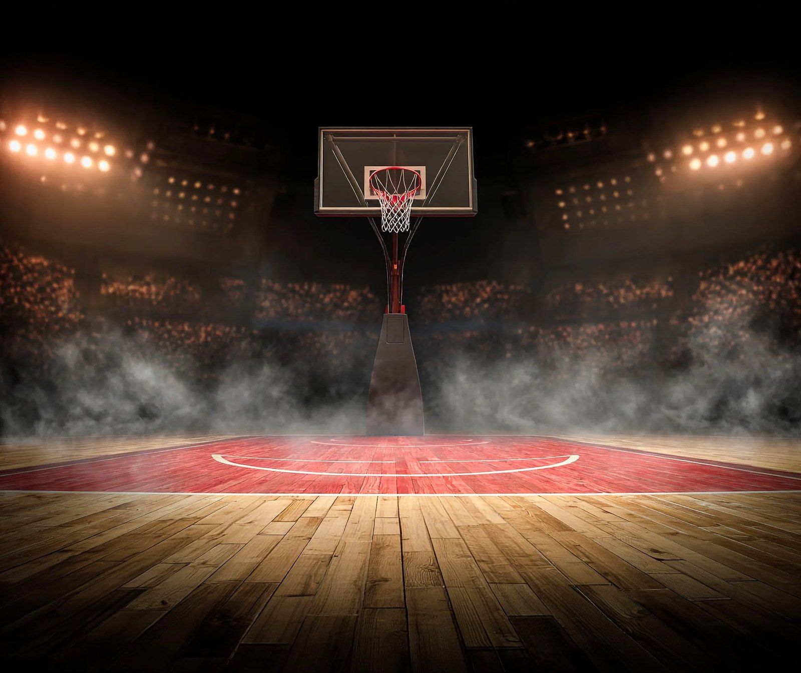 An empty basketball court under arena lights, the hoop centred, haze drifting across the key